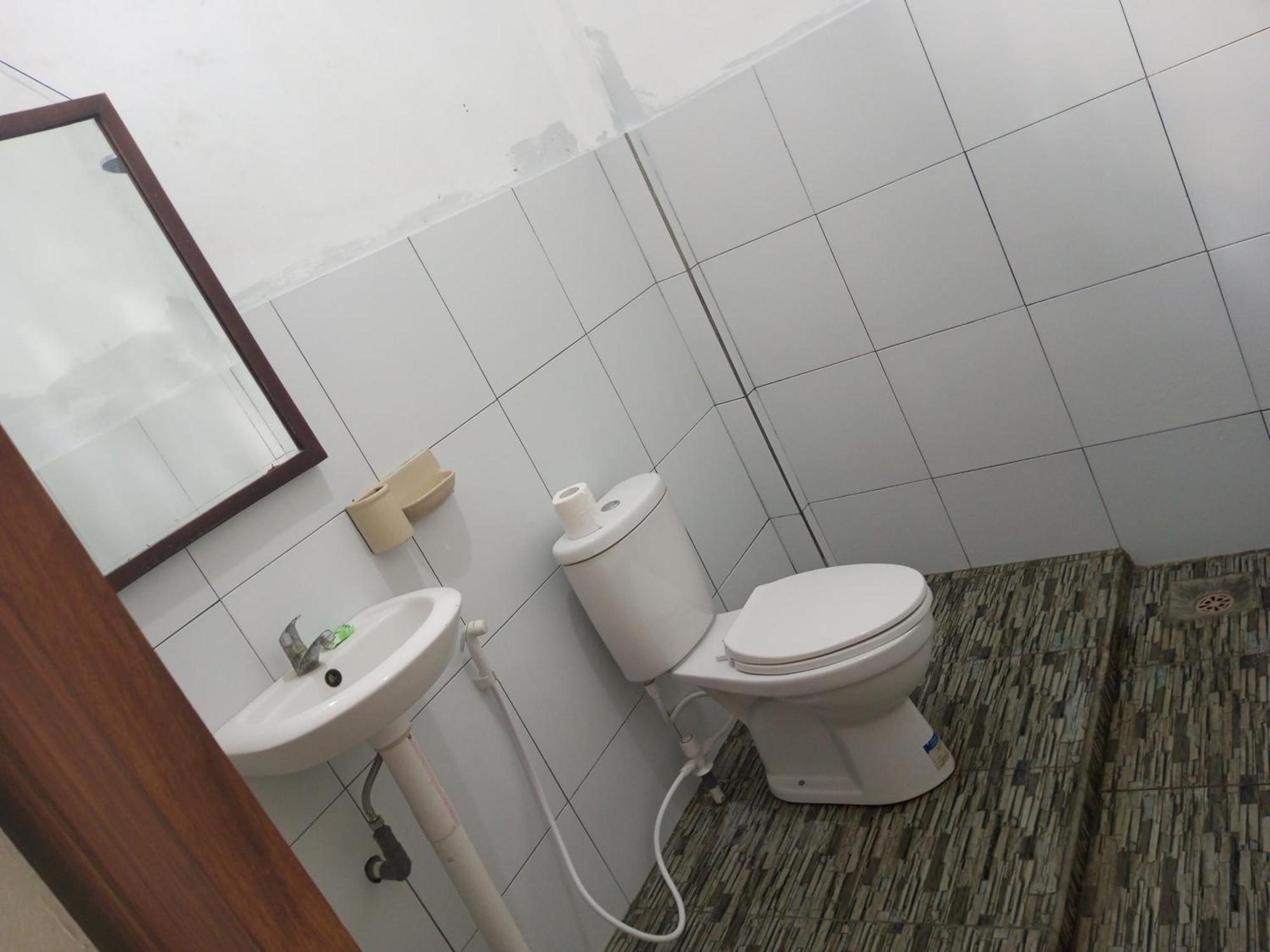 Kri Homestay Kuta  Zimmer foto